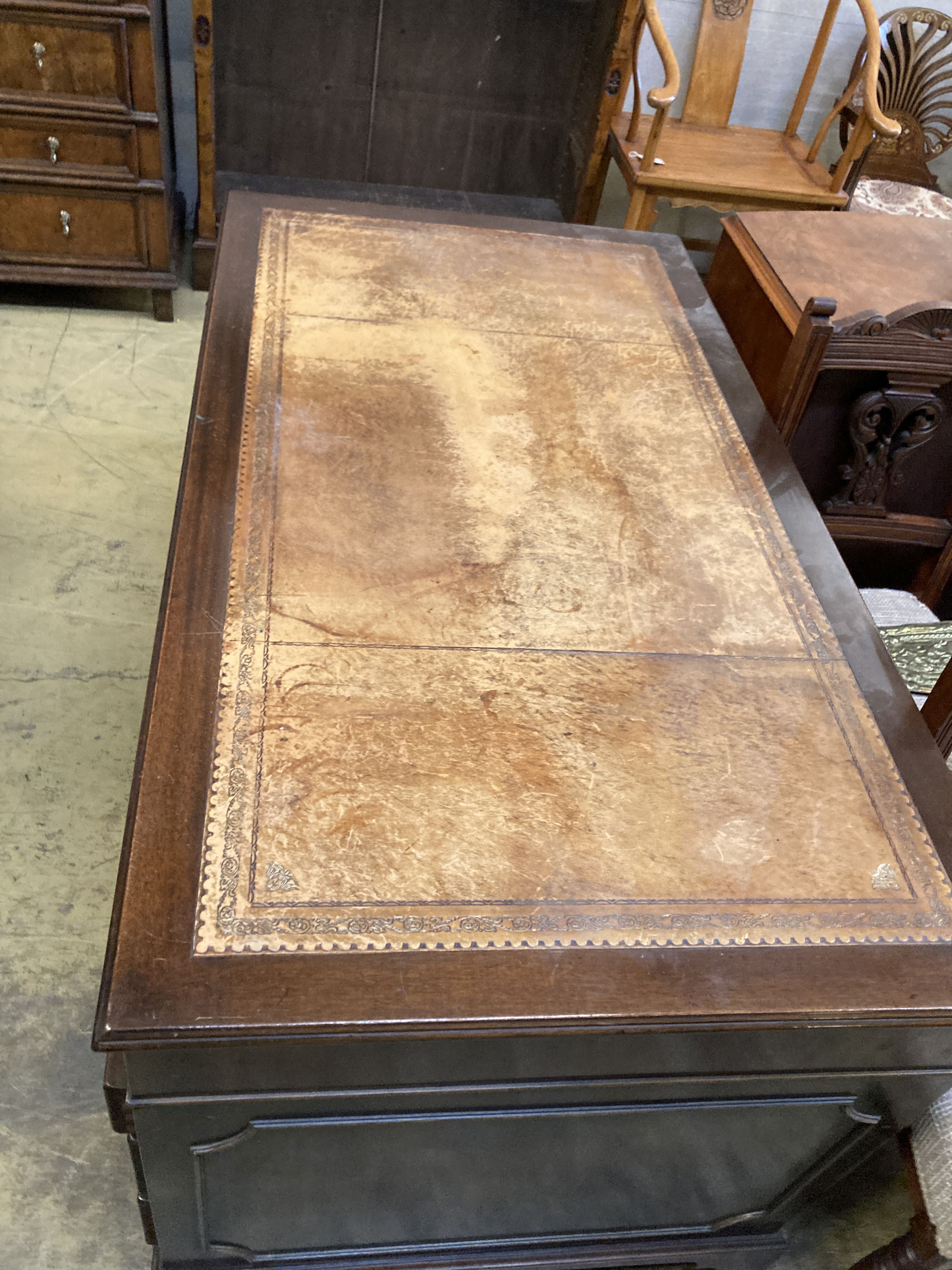 A reproduction mahogany pedestal desk, width 140cm, depth 76cm, height 78cm